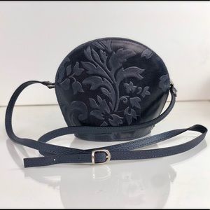 Navy blue over the should purse.